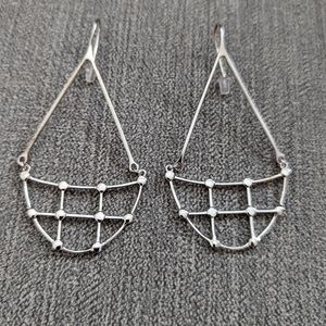 Silver tone statement earrings